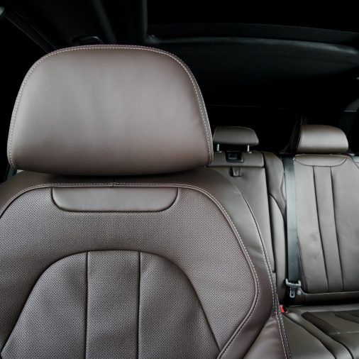Car dashboard, modern luxury interior, steering wheel